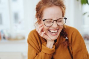 A woman smiles as she thinks about attending drug detox centers in Nevada or Arizona