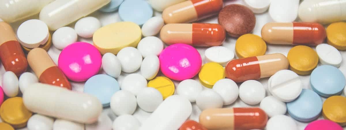 pile of various pills illustrating methamphetamine addiction treatment