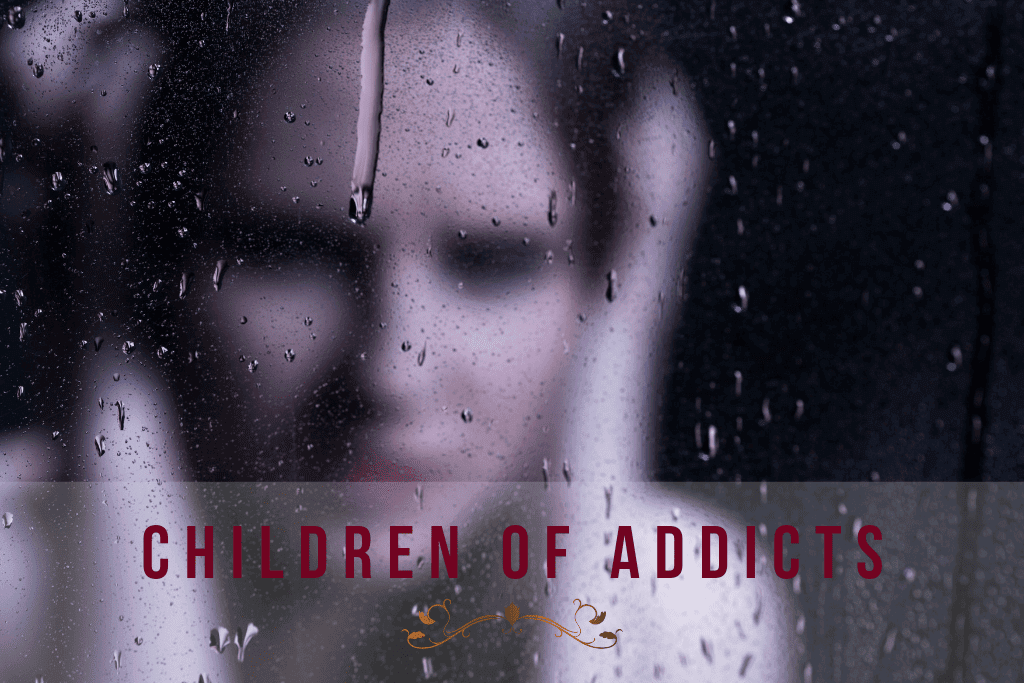 distraught woman holding head behind a blurry window illustrating the definition of 'the children of addicts'