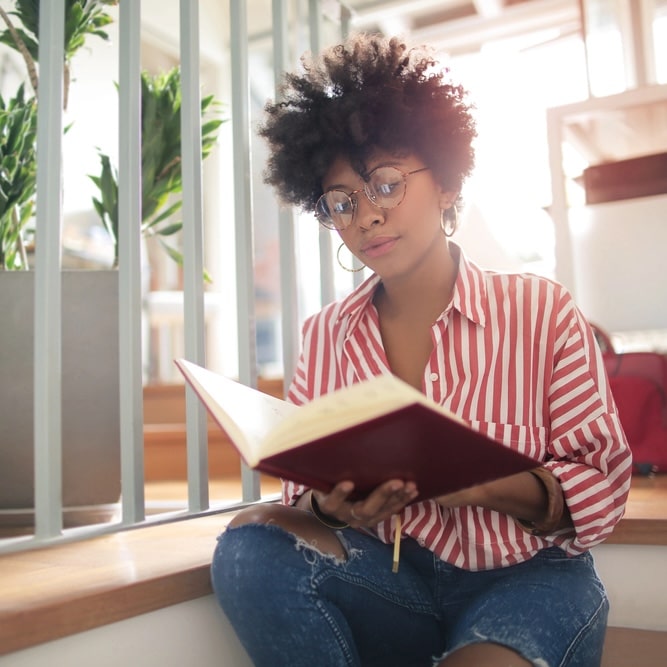 woman reading facts about addiction