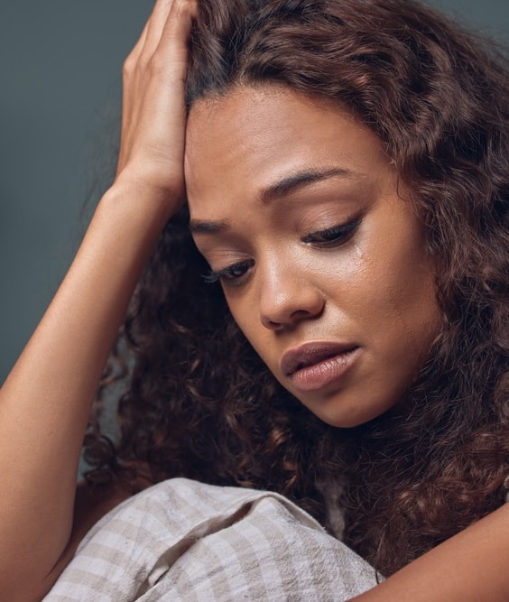 black tar heroin image of depressed woman